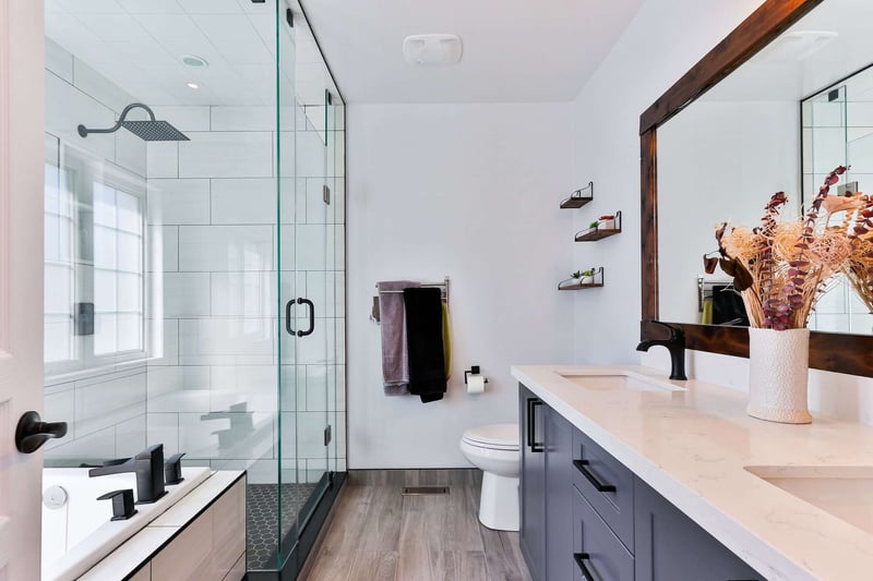 Blue bathroom vanity by Managed Renovations Bathroom-Remodel-Ideas-With-the-Best-ROI-1