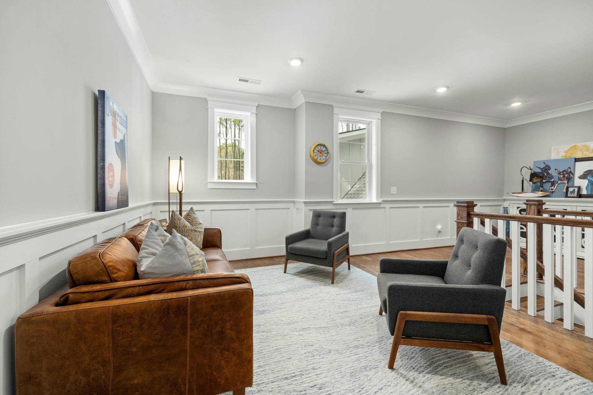 Comfortable loft sitting area in a whole home remodeling project by Managed Renovations in Chevy Chase, MD stock-optimized