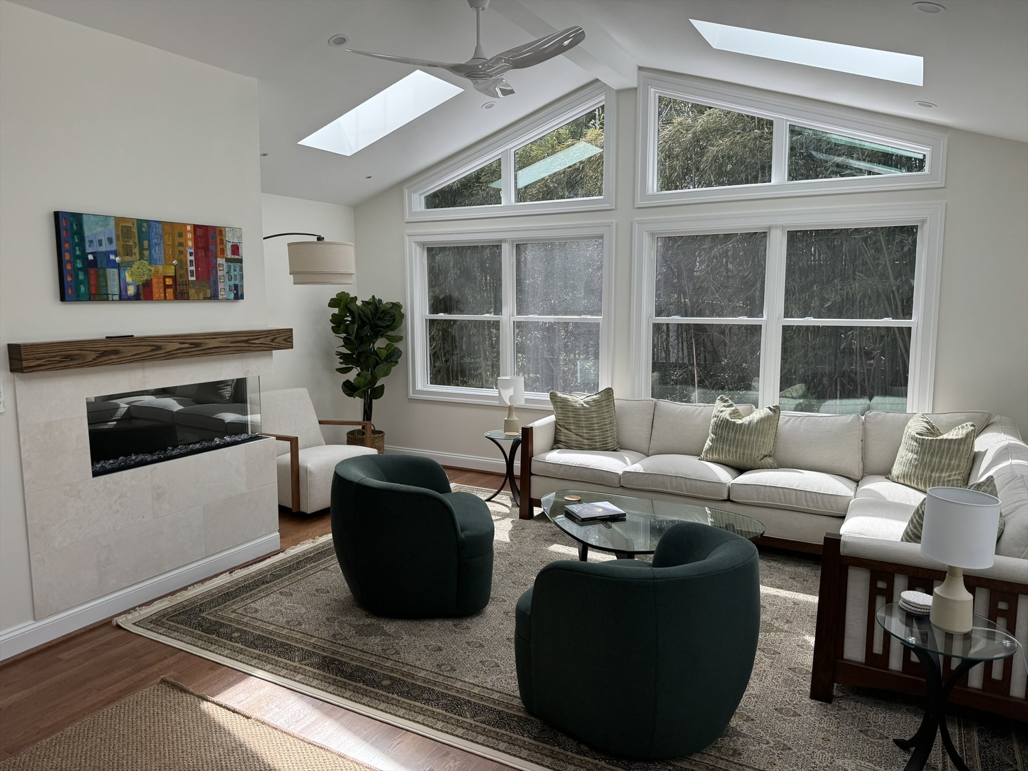 linear fireplace with arc floor lamp and fiddle leaf fig family room addition - optimized