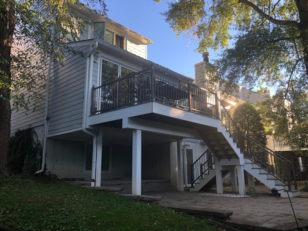 exterior view of elevated sunroom and deck addition in chevy chase md