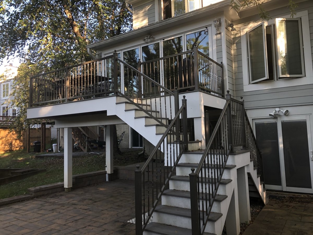 rear view of elevated deck and stairs in chevy chase md sunroom and deck addition