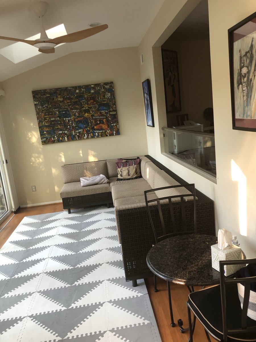 sunroom seating area with skylights in chevy chase md sunroom and deck addition