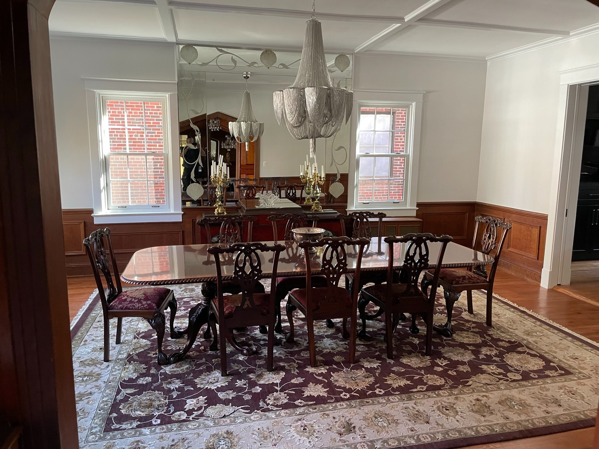 traditional dining room with wood wainscoting and chandelier in chevy chase md kitchen and hall bath remodel