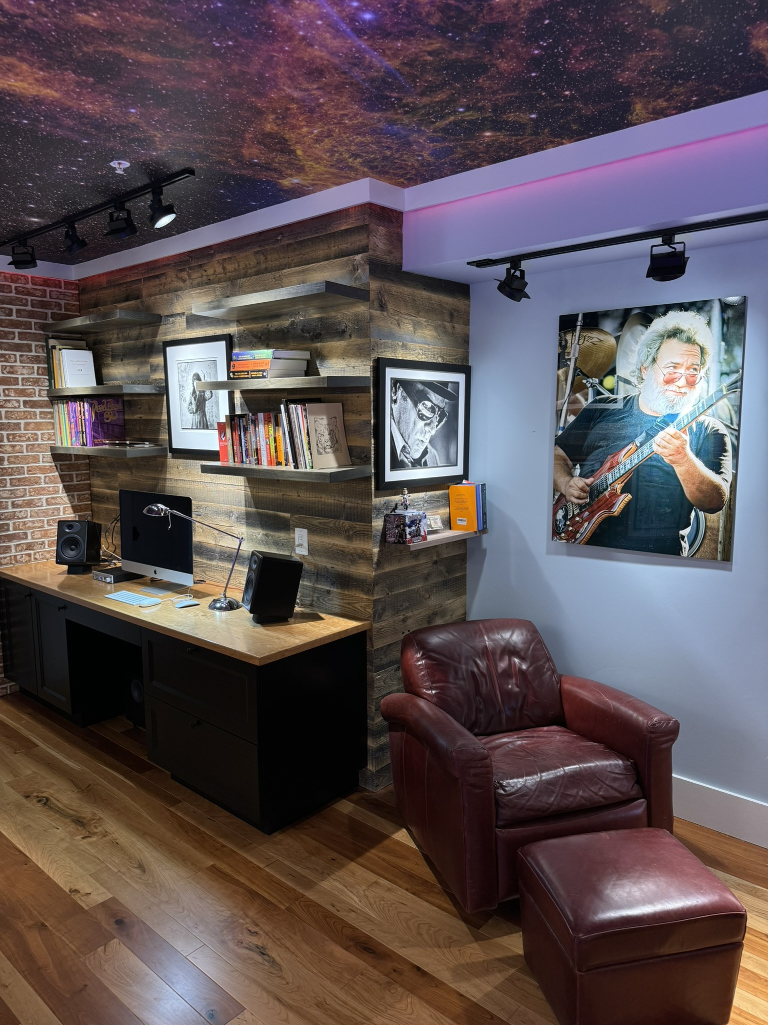 completed office remodel in Cabin John, MD with custom built in desk reclaimed wood shelving leather chair hardwood floors and g