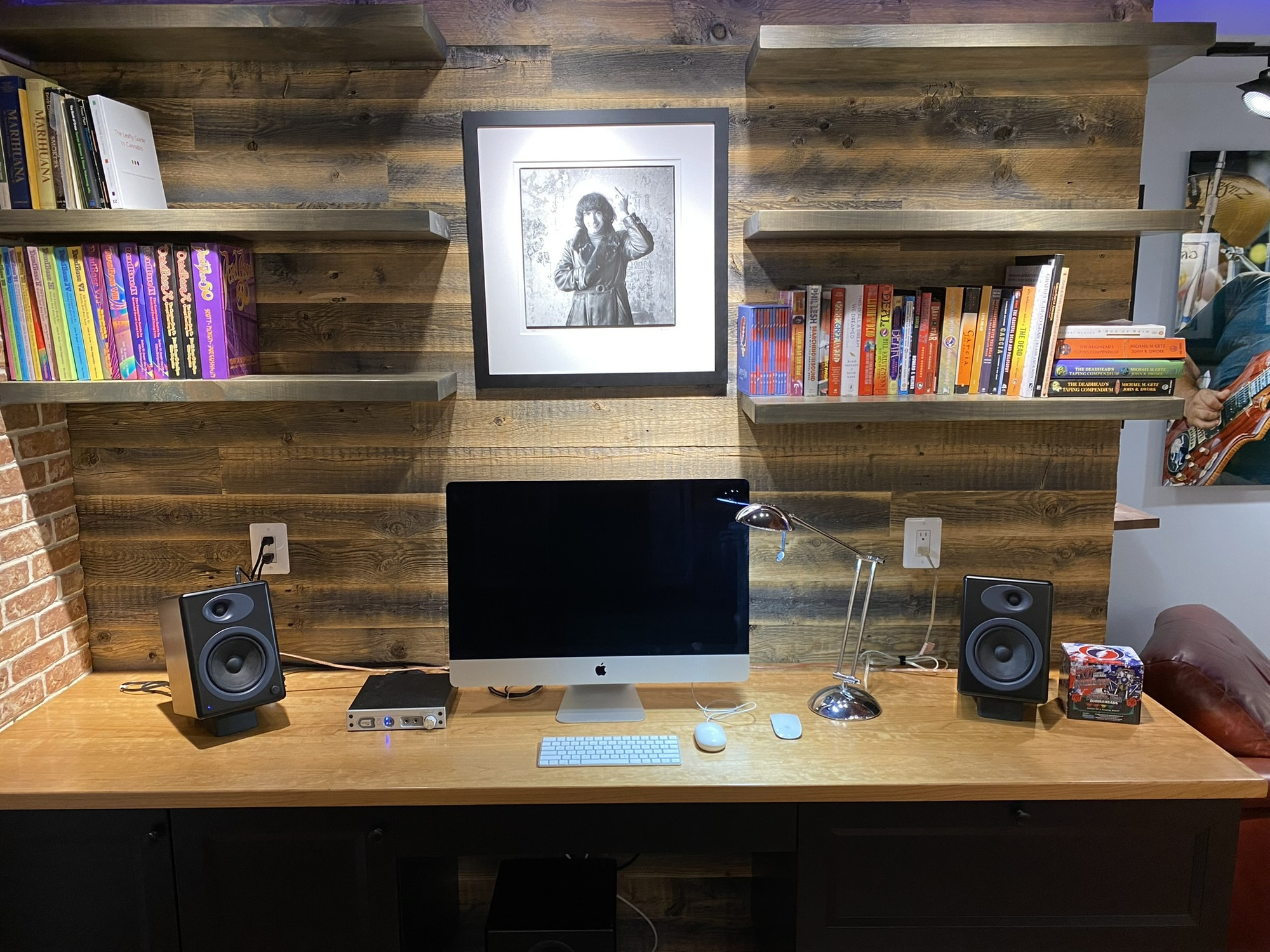 office remodel in Cabin John, MD with reclaimed wood wall floating bookshelves desktop computer speakers and custom built in des