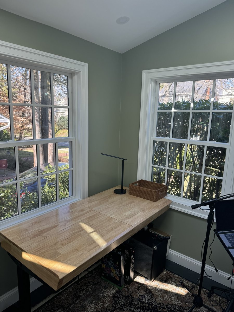 chevy chase md addition home office workspace with wood desk between large windows
