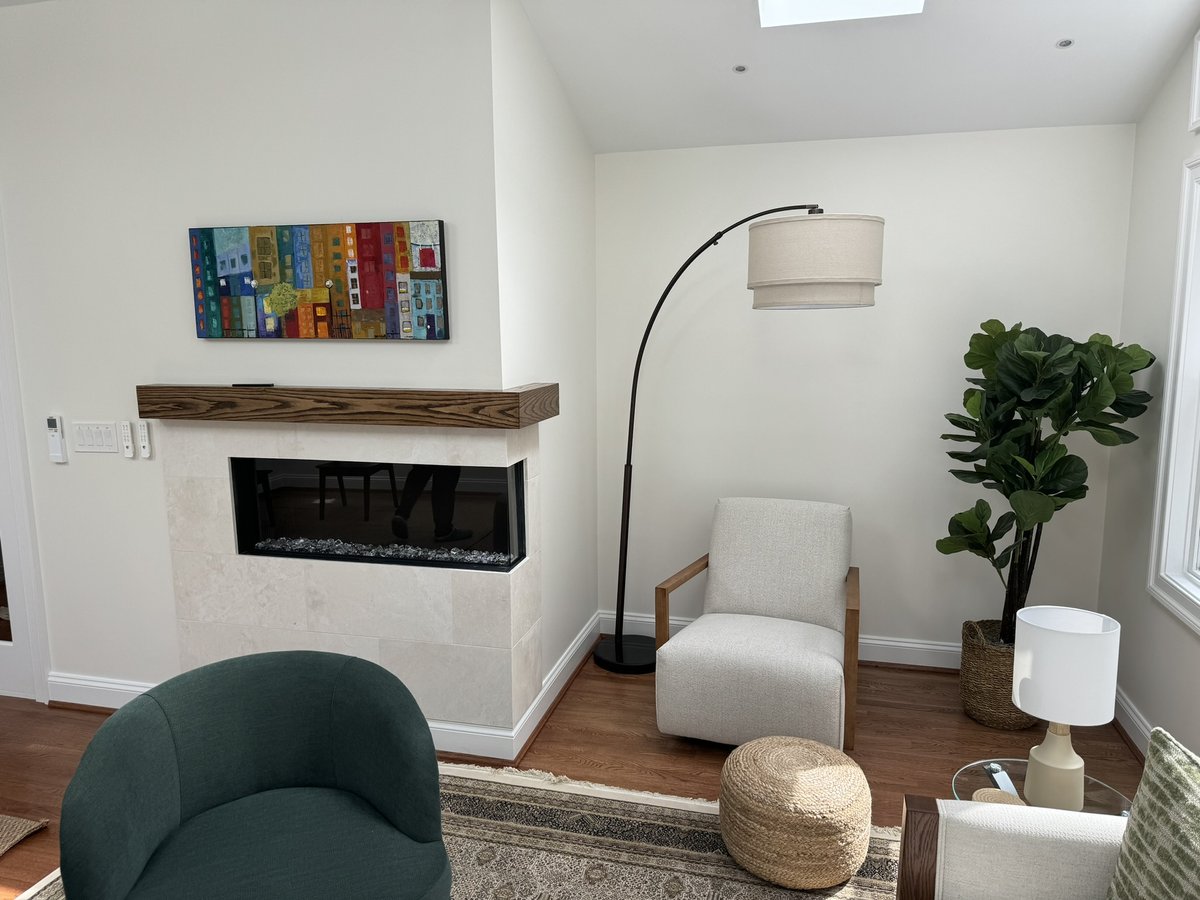 chevy chase md addition living room with modern fireplace seating and large windows