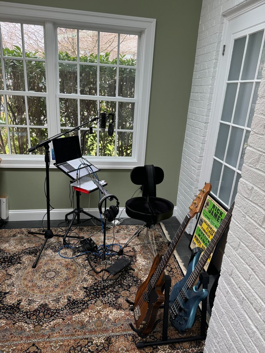 chevy chase md addition music studio with microphone keyboard bass guitars and window