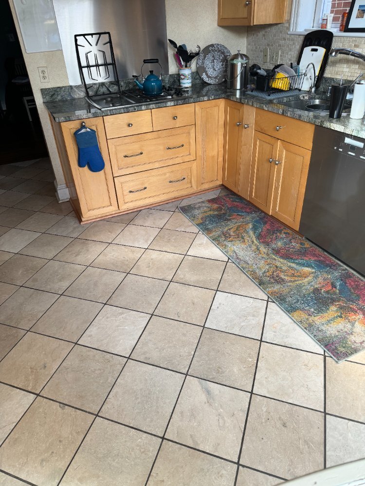 Existing kitchen cabinets, countertops, and sink before remodeling in Northwest Washington, D.C.
