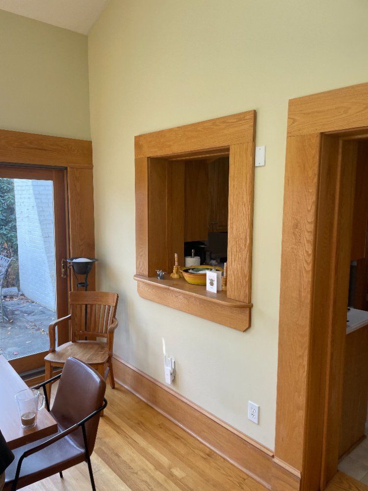 Existing pass-through opening between the kitchen and dining area before renovation in Kensington, MD.