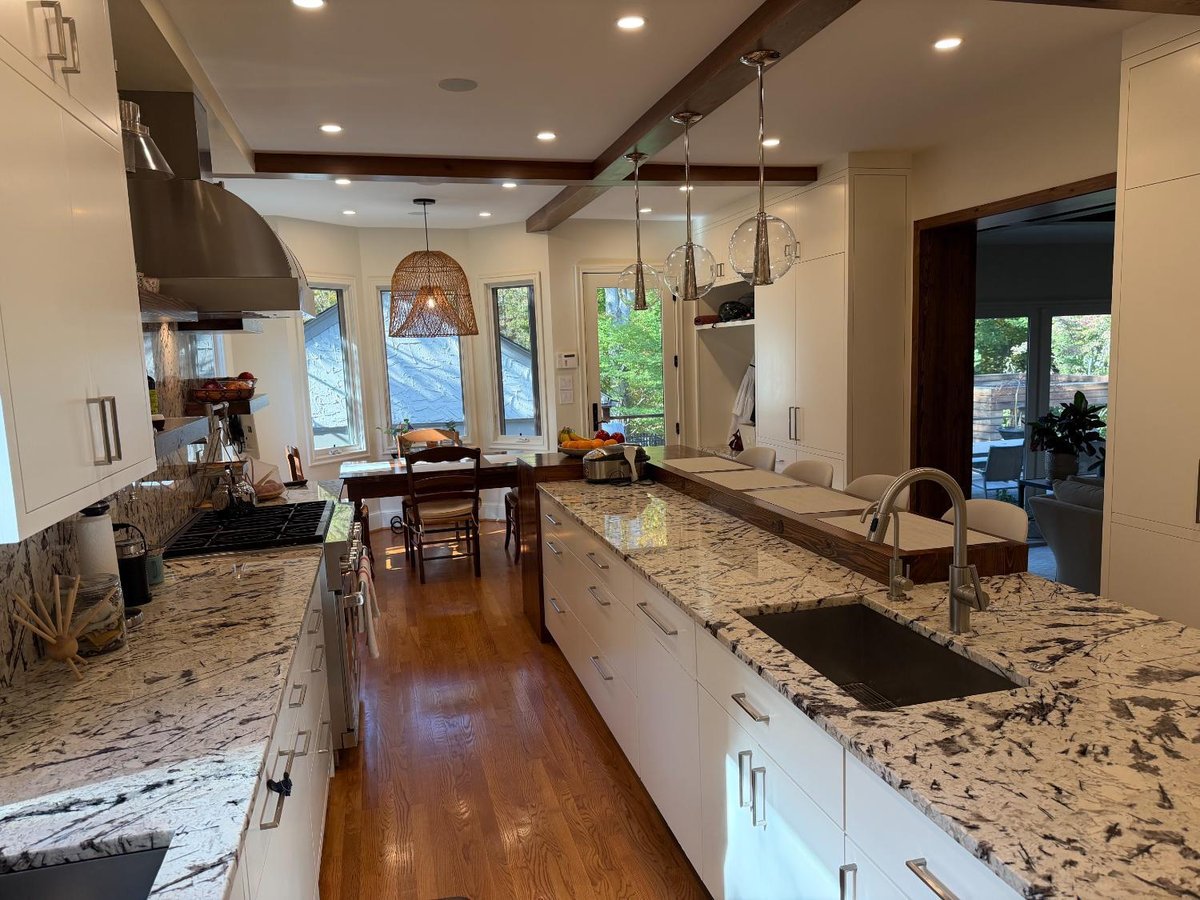 Kitchen renovation in Northwest Washington, D.C. featuring custom cabinetry and an integrated sink.