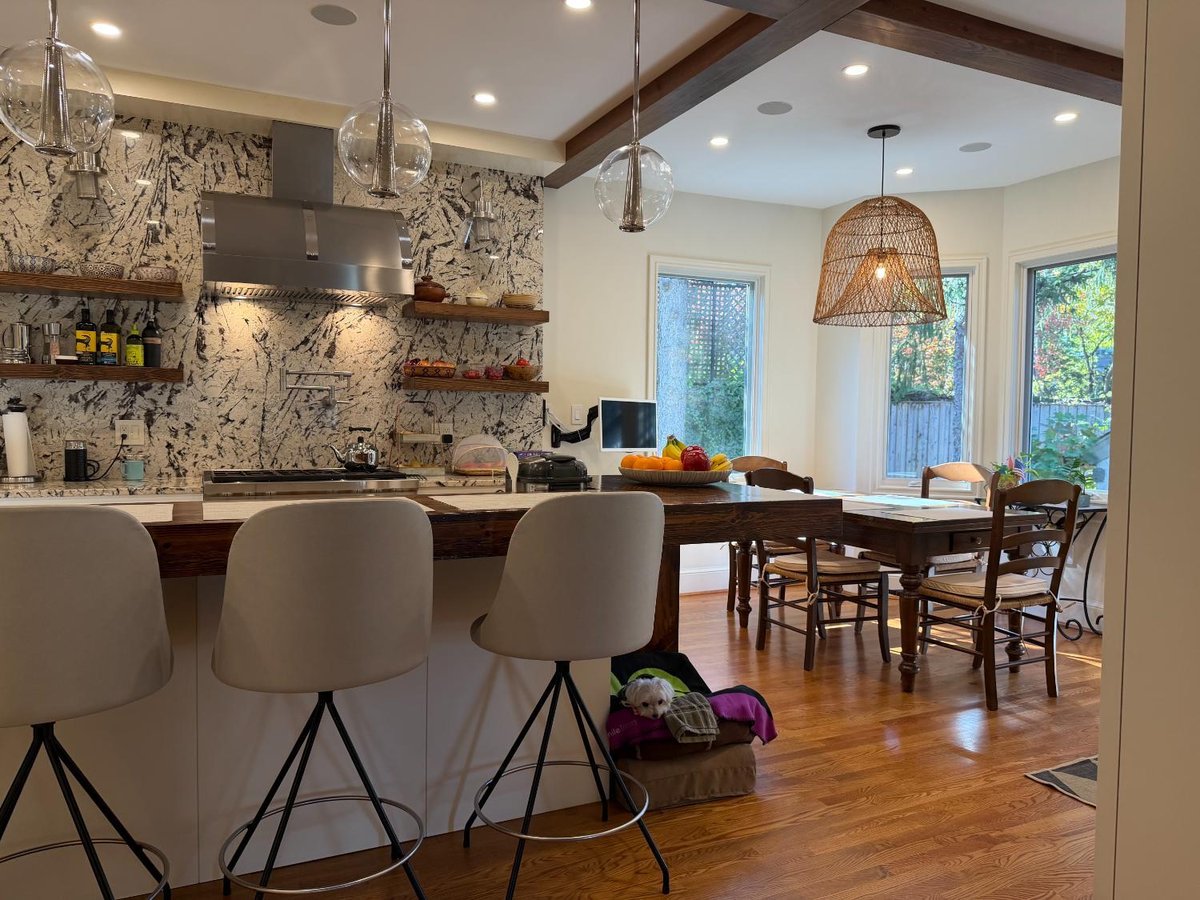 Open-concept kitchen remodel in Northwest Washington, D.C. featuring a custom island and breakfast bar.