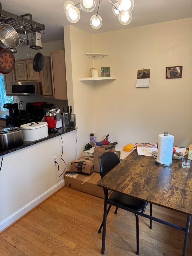 Existing dining area connected to the kitchen before remodeling in Chevy Chase, MD.