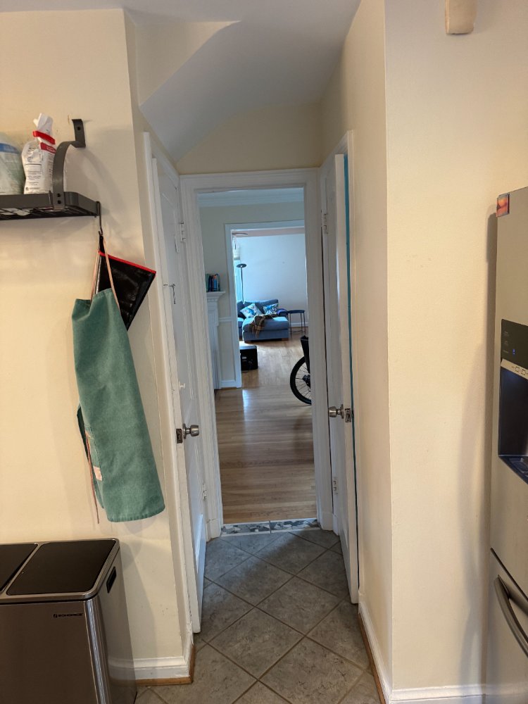 Existing hallway leading from the kitchen before remodeling in Chevy Chase, MD.