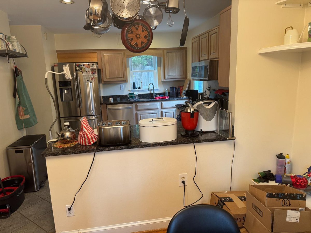 Wide view of the existing kitchen before remodeling in Chevy Chase, MD.