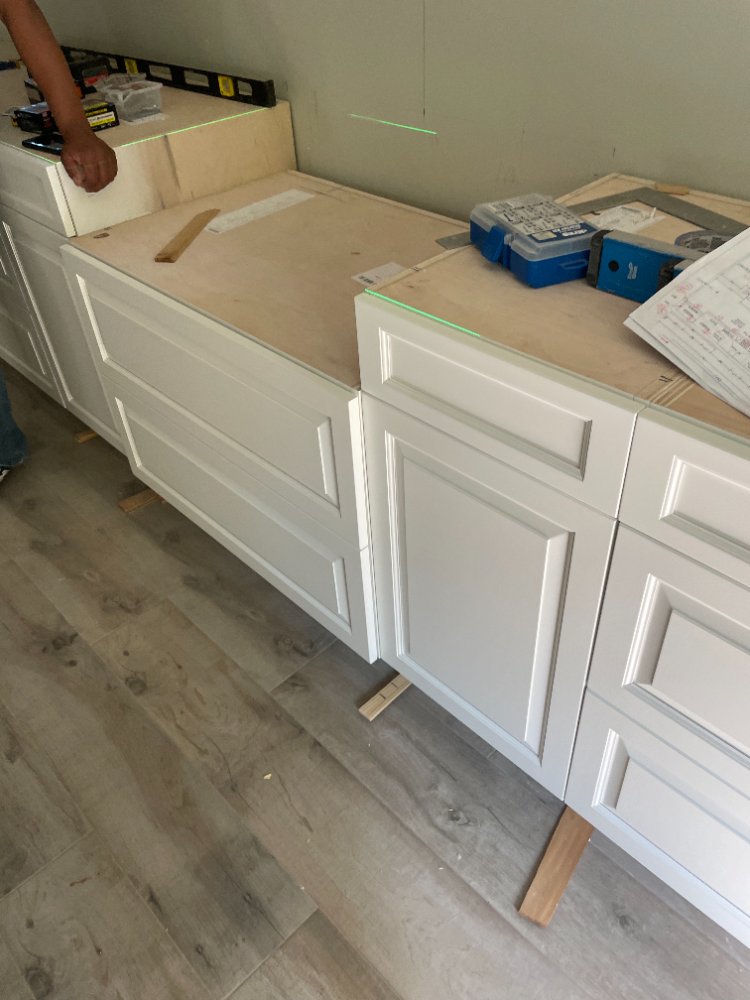 White shaker base cabinets installed during a kitchen remodel in Bethesda, MD.