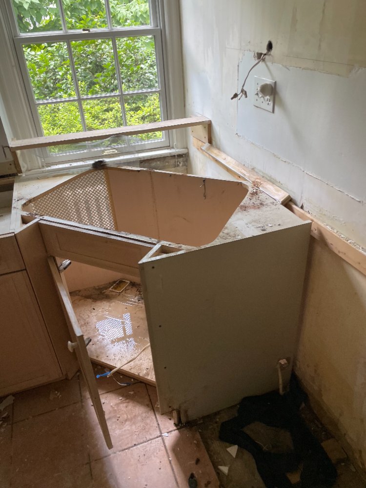 Demolition begins on the kitchen remodel in Chevy Chase, MD with cabinets and countertops removed.