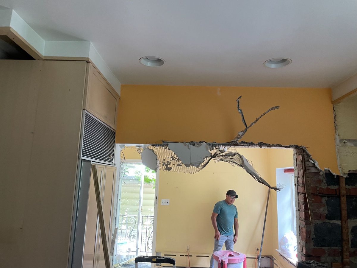 Structural demolition continues during the kitchen remodel in Chevy Chase, MD with walls opened up.