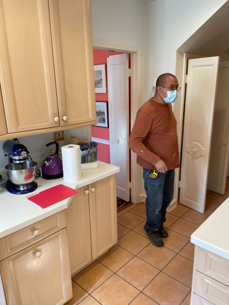 Pre-construction photo of the kitchen remodel in Chevy Chase, MD showing the original kitchen layout before renovation.